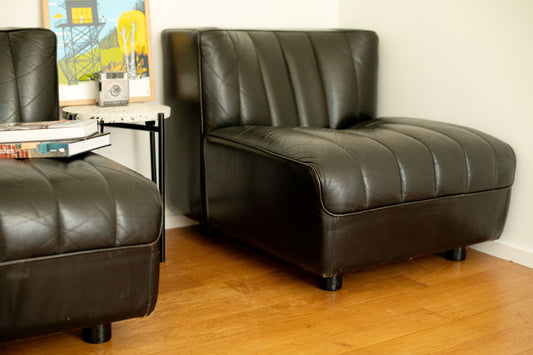 Black leather Tito Agnoli seats