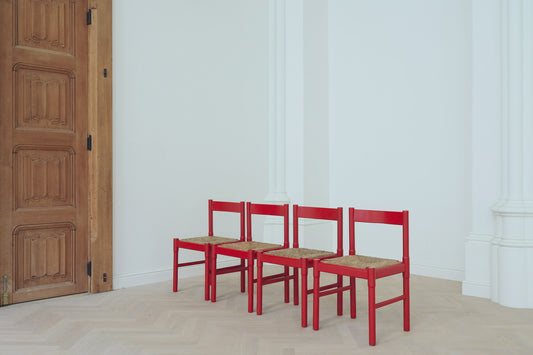Set of four red chairs